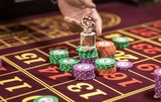Monixbet casino presented on mobile device in Pakistan with slots and live games
